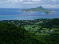 Photo taken from the island of Carriacau, part of Grenada. The island visible on the horizon is Petit Martinique, also part of Grenadan territory